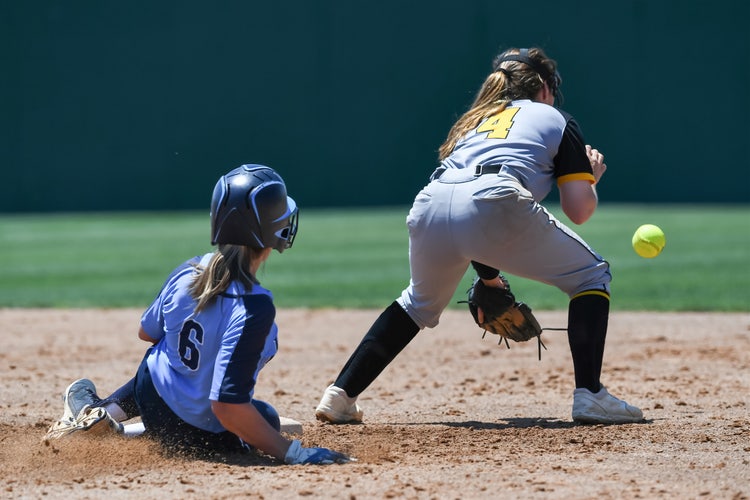 Softball players in action.