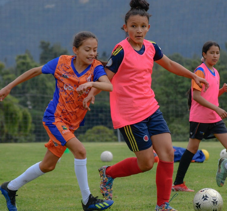 Youth soccer team on field in-game